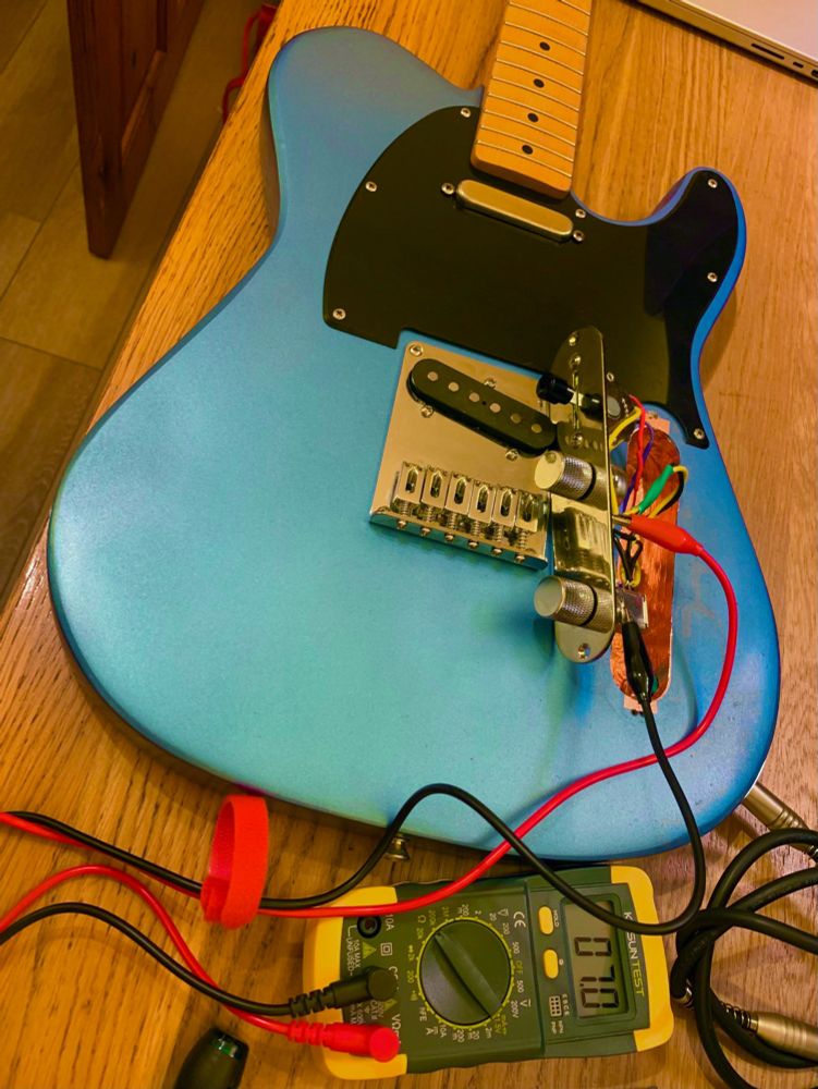 Homemade guitar with all the electronics out.