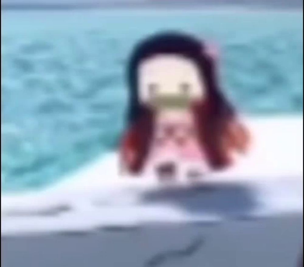 a blurred image of a girl sitting in a pool .