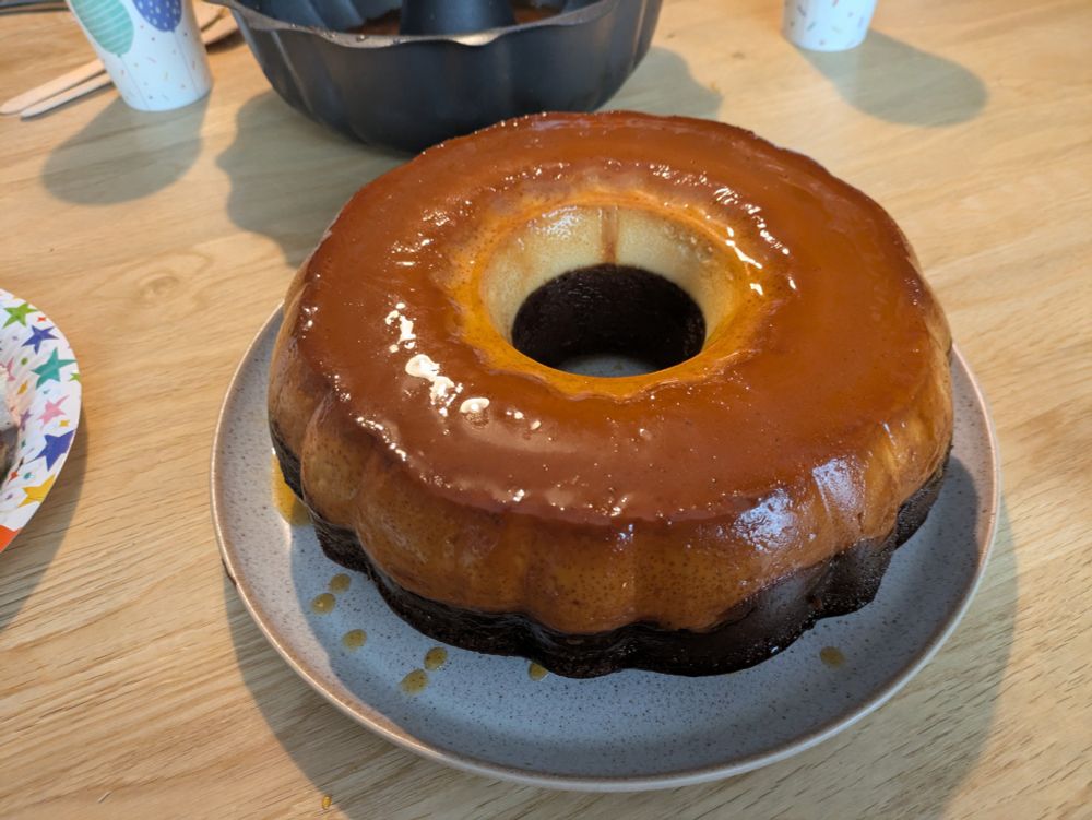 Chocoflan, a chocolate cake base with an upper half made of creamy flan, coated in caramel sauce