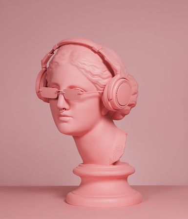 Bust of a female head with headphones and sunglasses.  All in pink.