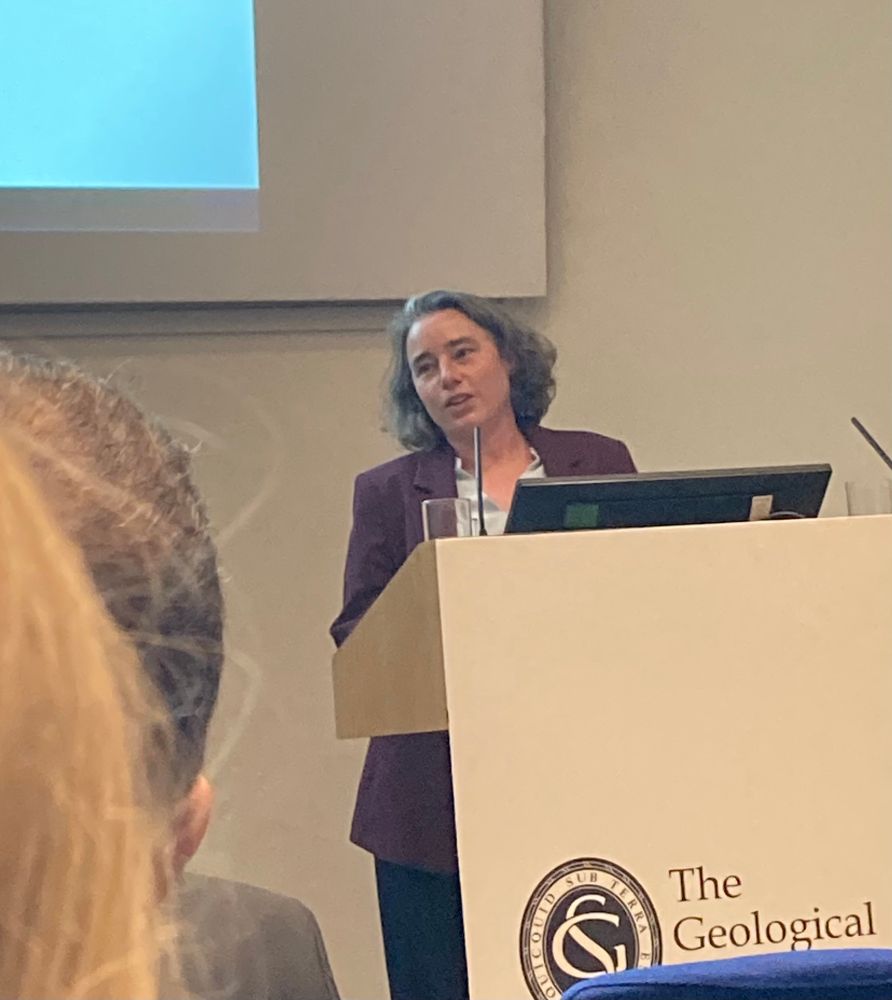 Photograph of Kathryn Goodenough, British Geological Survey, accepting the Coke Medal