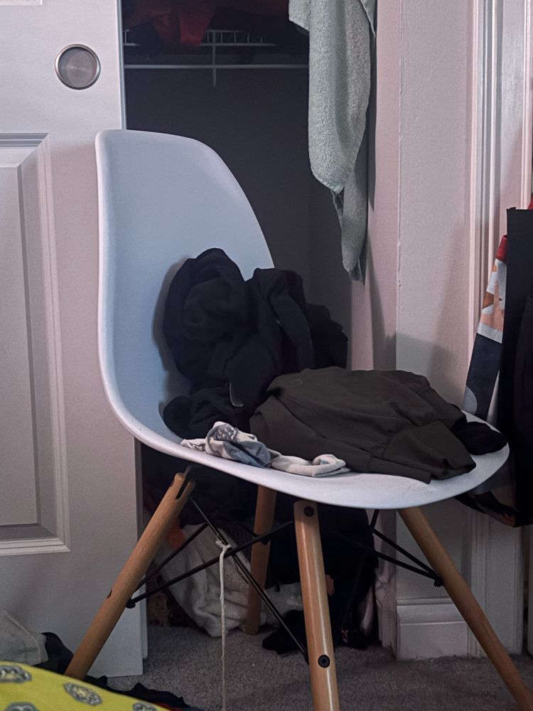 the same style of chair in my bedroom, functioning as a laundry seat (the chair you throw your clothes on). i got it for free, it's a very comfortable chair