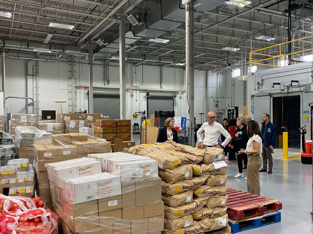 Mark Watts is shown around Boston's new cold food storage hub. In the warehouse, we see fresh food that would otherwise go to waste reach food insecure families across the city.
