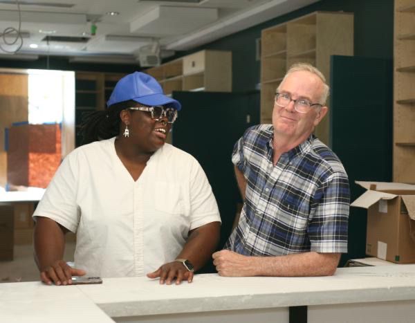 Porsha Olayiwola and Bing Broderick inside Just-Bookish, a new book store and community gathering space that they plan to open this month on the ground level of Dot Crossing, a new mixed-use building at 1469 Dorchester Ave. in Fields Corner. Seth Daniel photo
