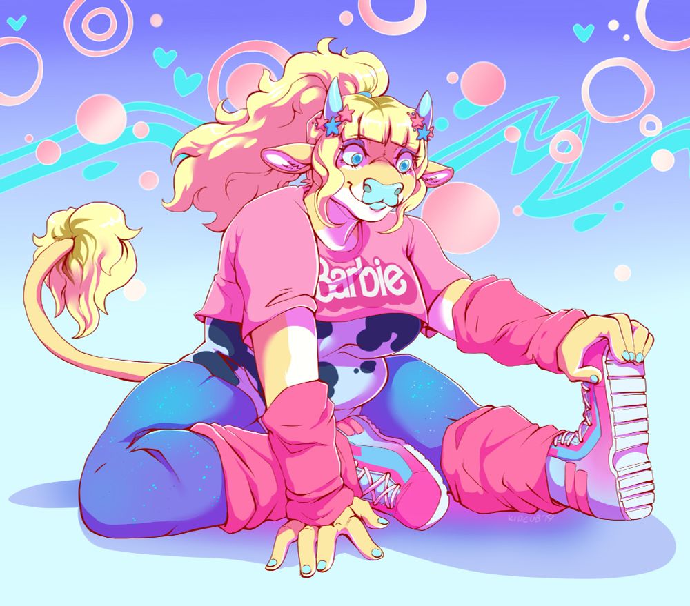 A blonde colored bovine furry sits on the floor stretching out her leg. She is dressed in bright blue leotard with cow print, pink arm and leg warmers and a barbie mini crop top overtop. 