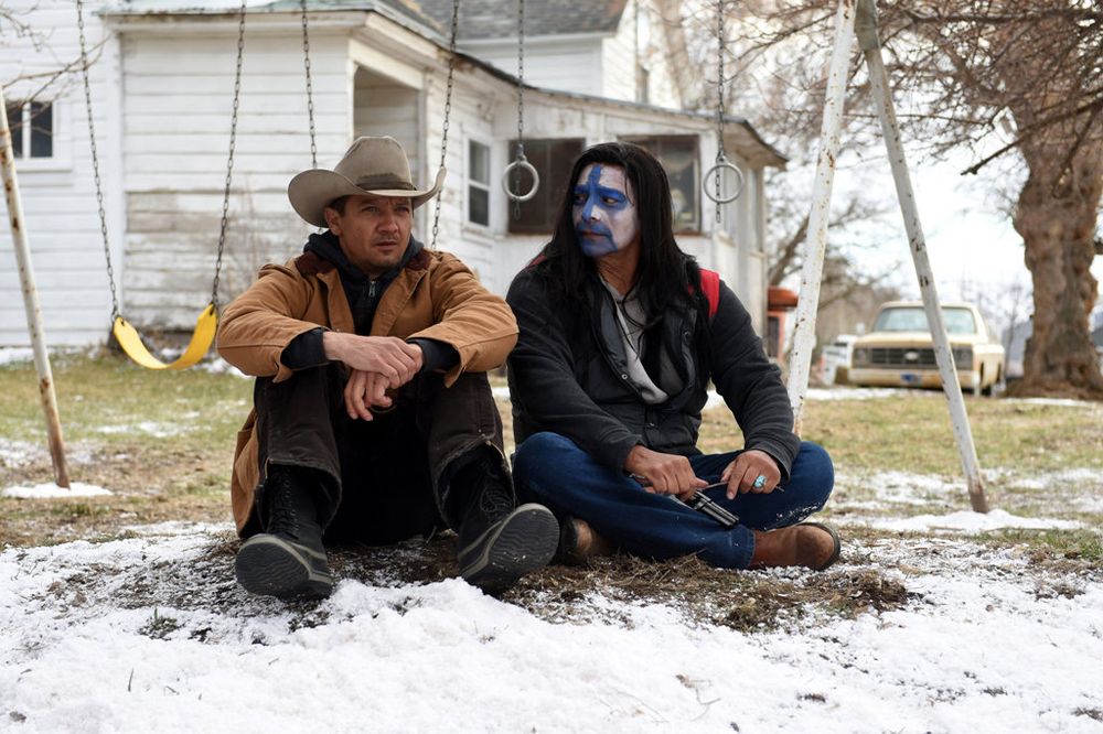 A screenshot from ‘Wind River’ (2017) Jeremy Renner and Gil Birmingham are fathers grieving for their murdered daughters.