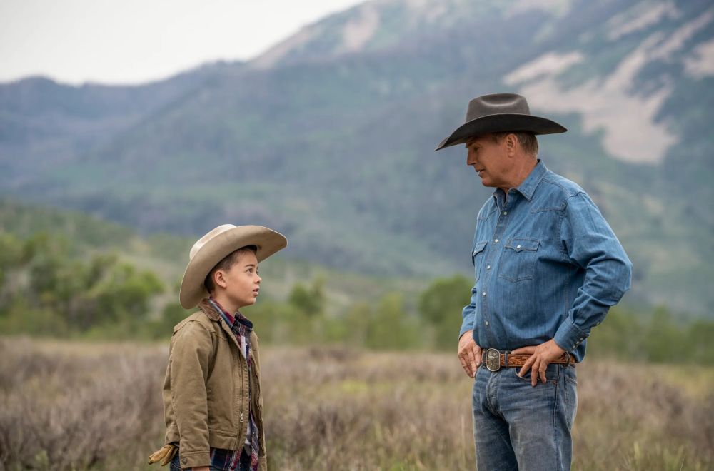 Screen shot from ‘Yellowstone’ (2020-24) Kevin Costner is Don Corleone in cattle country, pictured here with his grandson, portrayed by Brecken Merrill.
