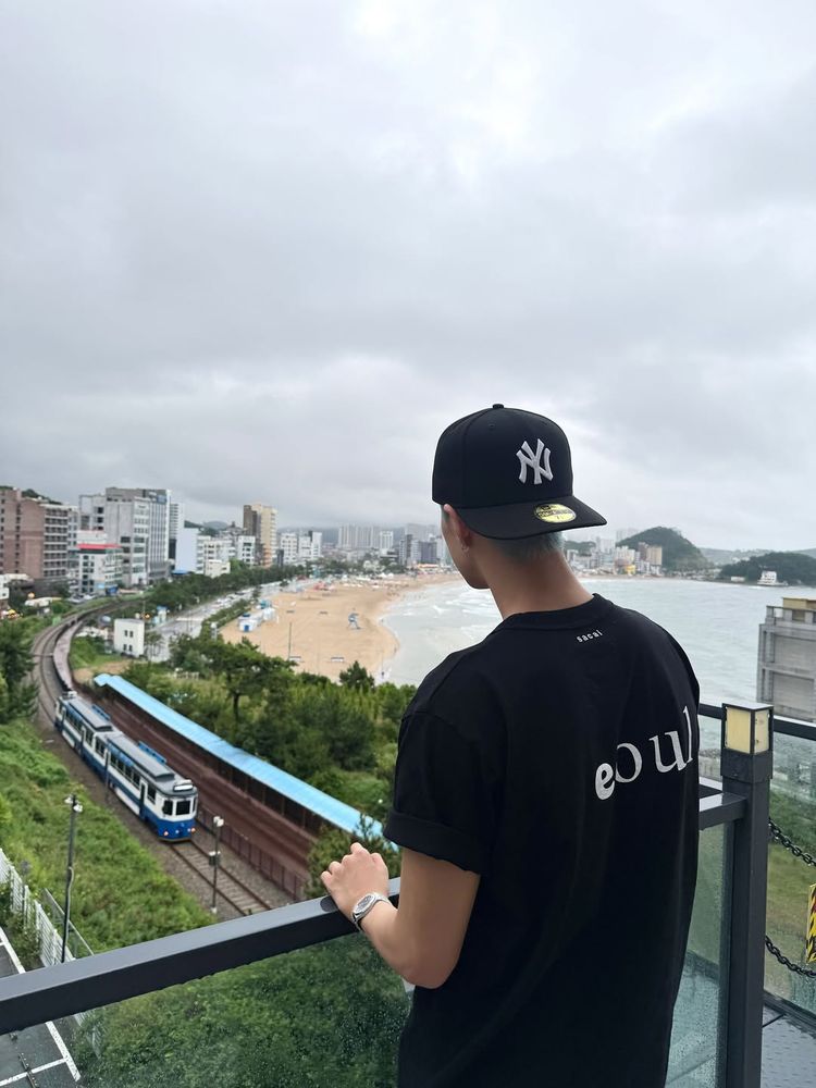 hoshi looking out over a beach
