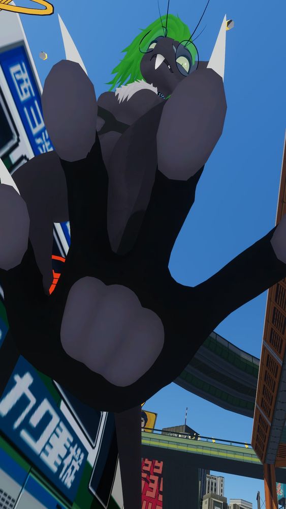A particularly tall monochromatic grey yinglet with bright green hair looks down at the viewer between two toes, with its foot in the foreground. It has a deep grin on its face, and seems content with being larger.