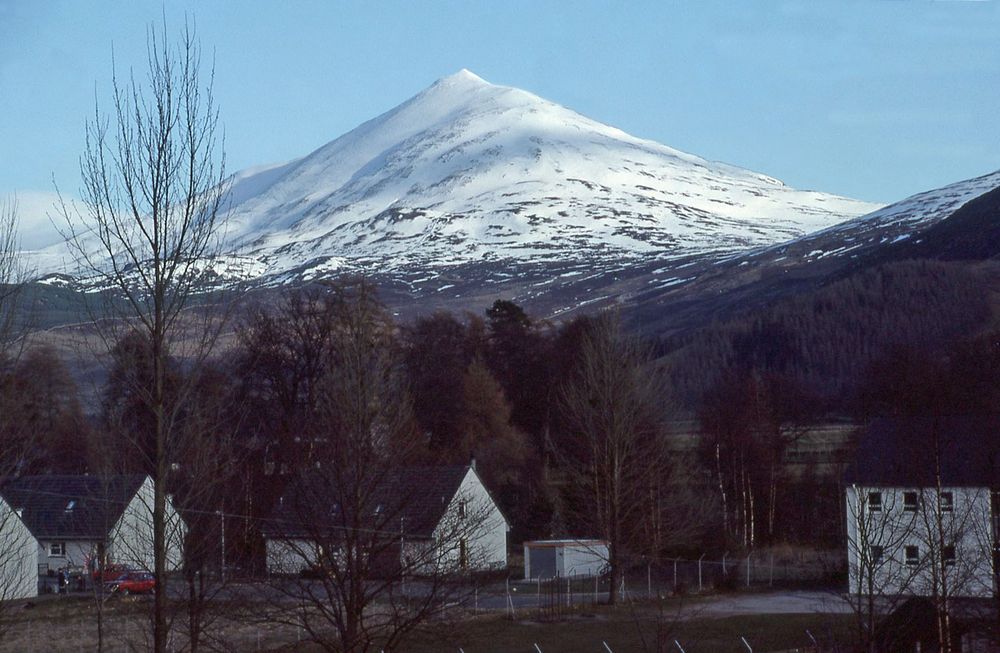  The snow covered triangular peak of Schiehallion on a bright spring day.