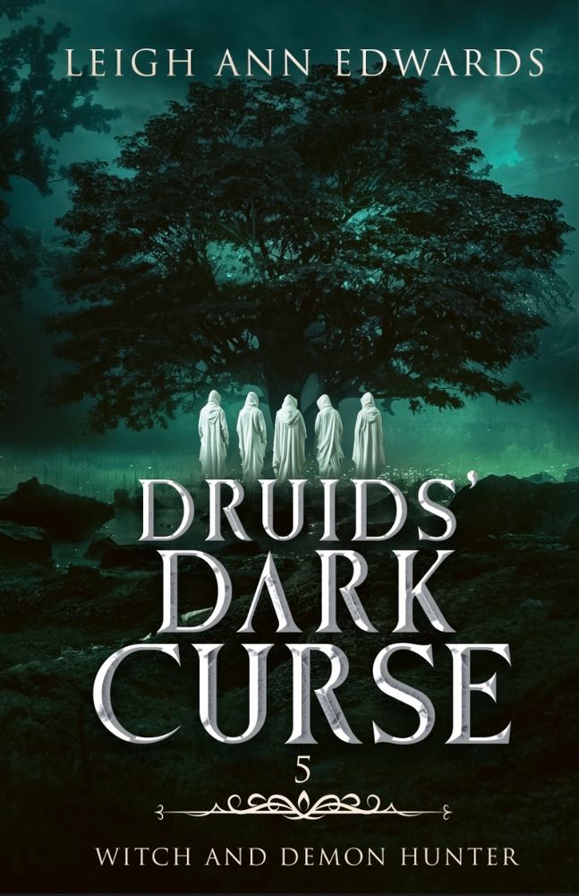 Five figures in hooded white robes stand before a huge oak tree. Rolling dark green landscape is in the foreground and the sky is a misty ominous-looking pale green. 