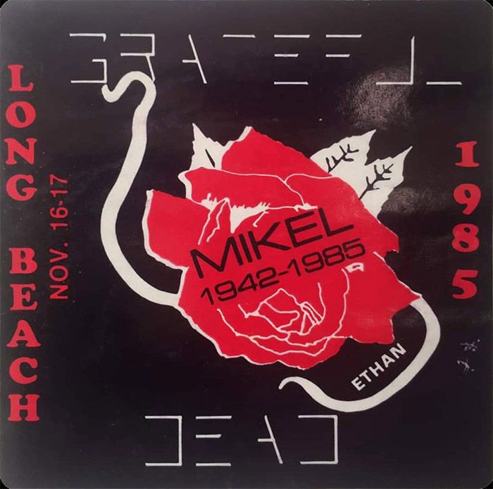 parking lot sticker for Long Beach Nov 16-17, black sticker with red rose reading MIKEL 1942-1985
