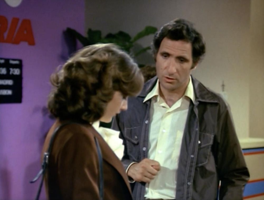 Judd Hirsch as Alex Rieger on Taxi wearing a white button-up shirt with a gray jacket
