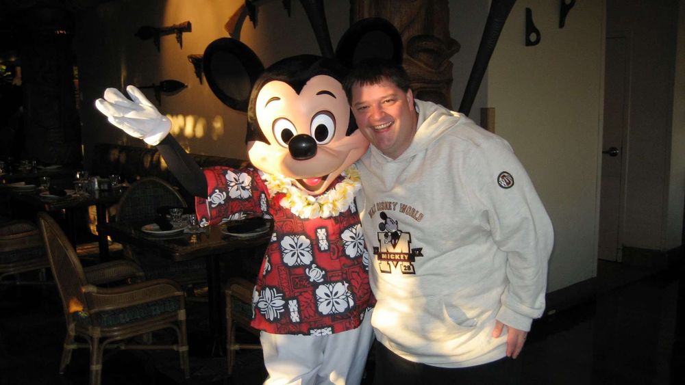 Fat Chris standing next to Hawaiian Mickey.