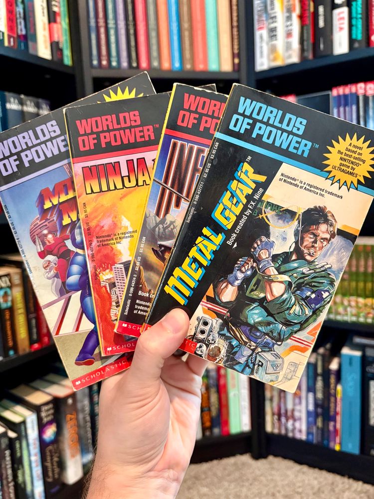 Worlds of Power books based on Metal Gear, Infiltrator, Ninja Gaiden and Mega Man 2. 