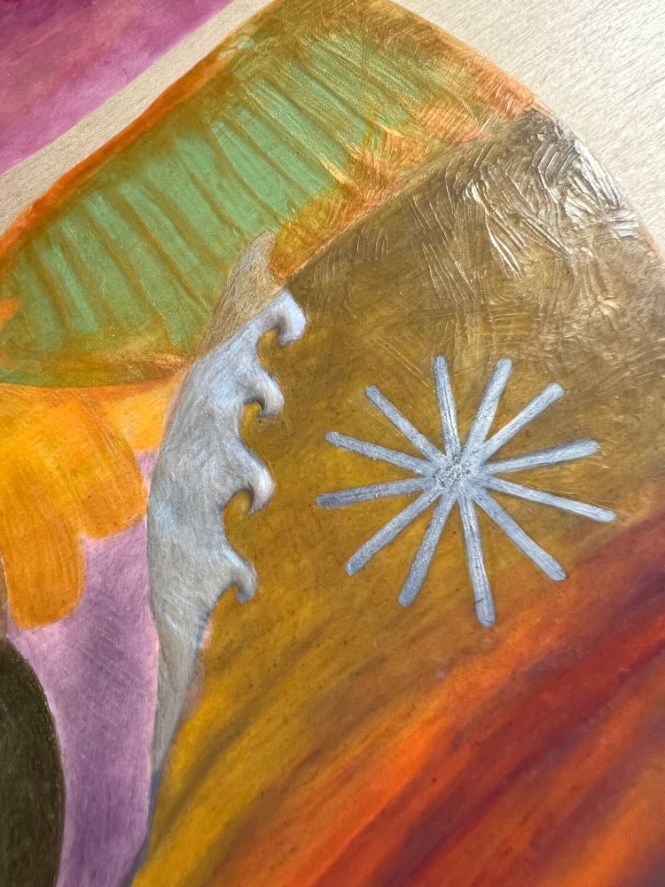 A detail image of an encaustic painting with a star, multi-color layers and a little carved set of iridescent ocean waves