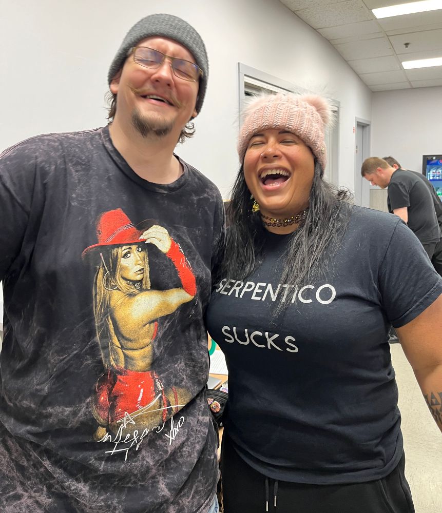 Mike and Nyla Rose in full laughter.