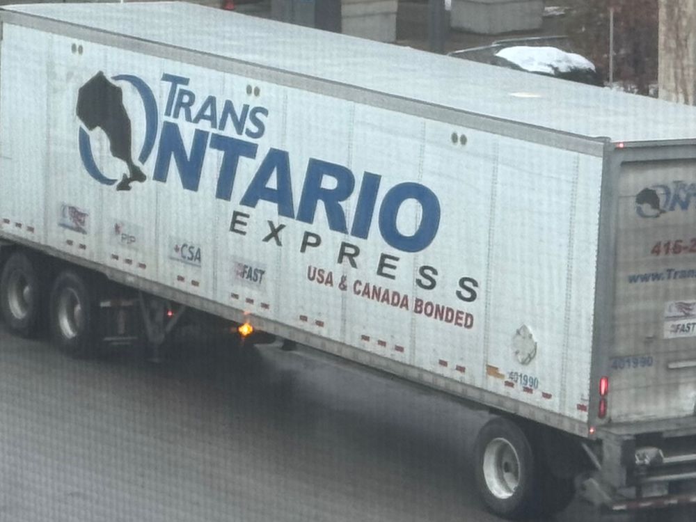a transport truck labelled "Trans Ontario Express"