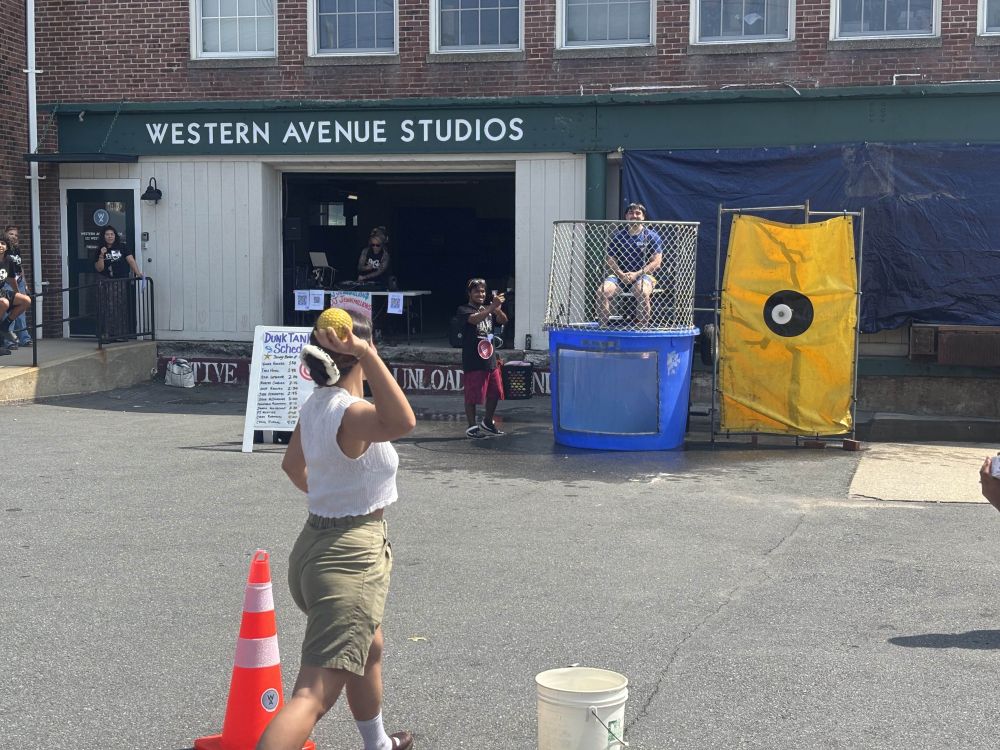 council candidate Marcos Candido in the tank with his girlfriend throwing