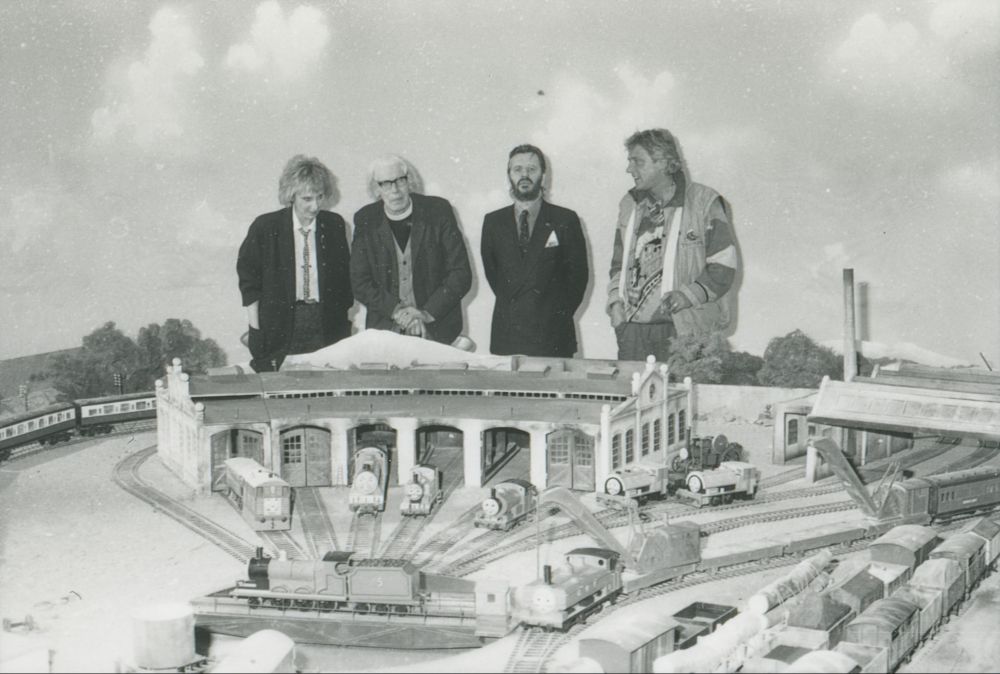 Britt Allcroft, Rev W Awdry, Ringo Starr and David Mitton on the Tidmoth Sheds set