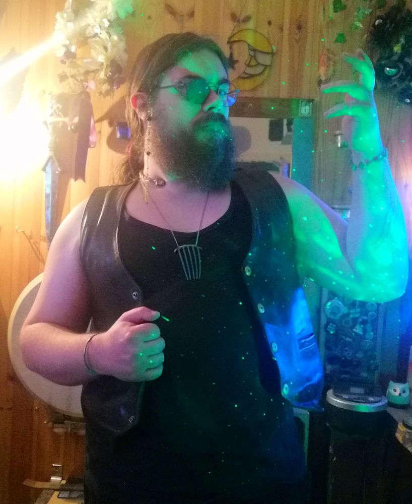 Me, standing, half bathed in green light. One arm up like I'm about to pop claws or something. But in a cool Dracula way, not in a silly Wolverine way