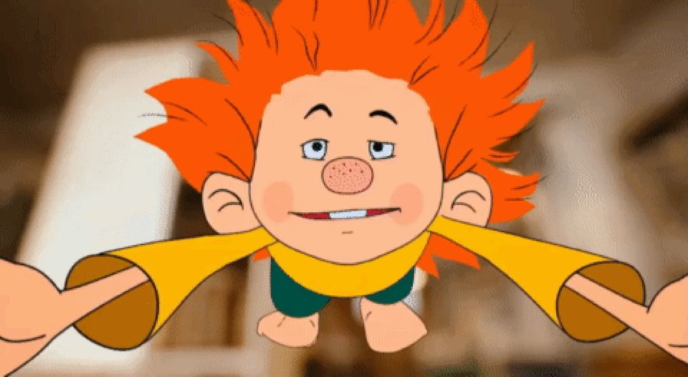 a cartoon character with red hair and a yellow shirt is smiling