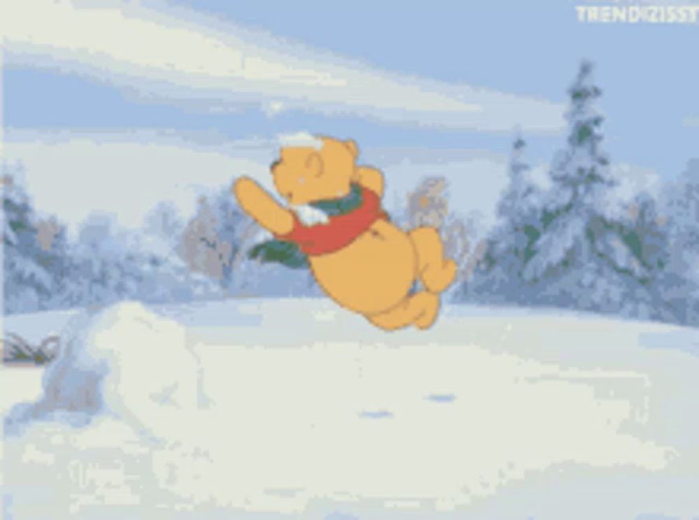 winnie the pooh is playing in the snow with a christmas tree in his hand