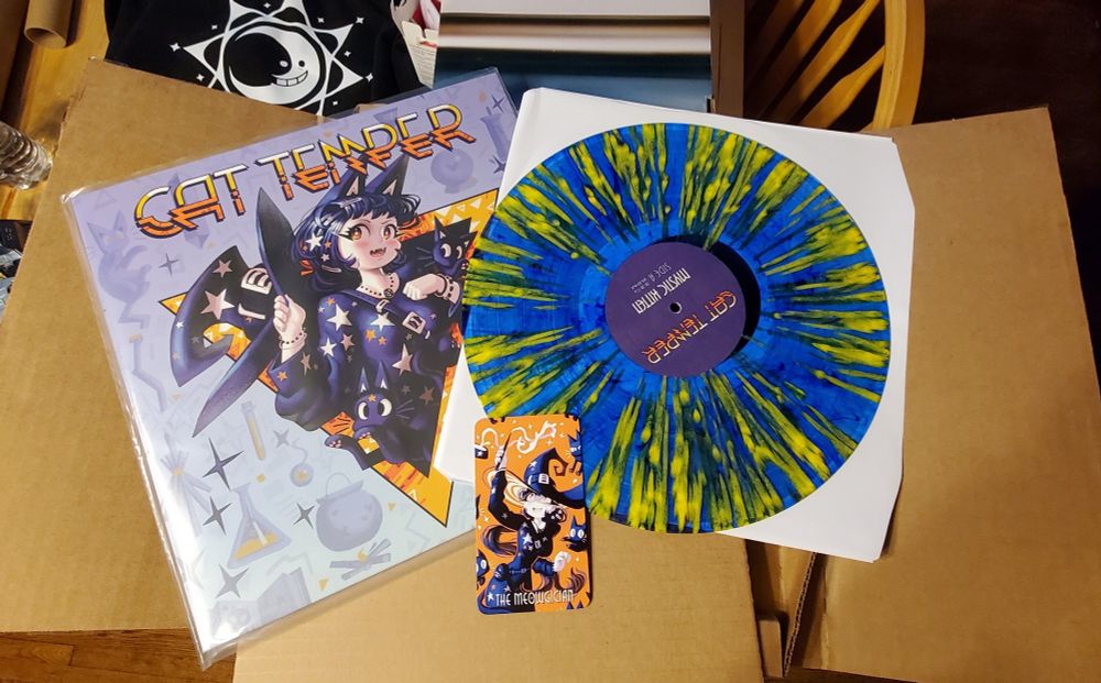 Cover art and vinyl record of Mystic Kitten by Cat Temper. Cover art shows magical cat girl bursting from a triangular gold logo.