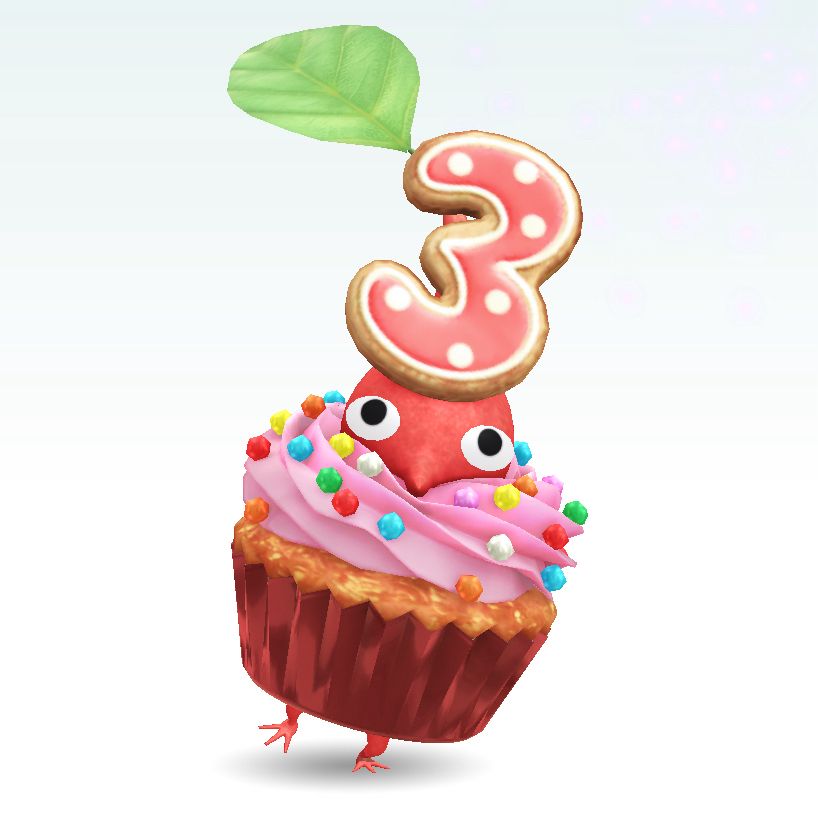 red pikmin wearing a cupcake with a 3-shaped cookie on their head  