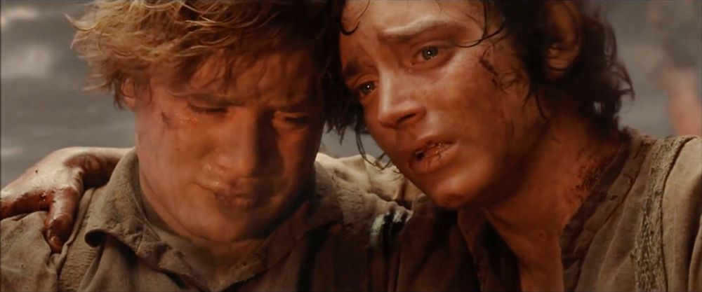 Sam and Frodo after destroying the one ring, and assuming they are about to die.