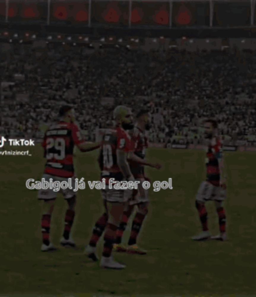 a group of soccer players on a field with the words gabigol ja vai fazer o gol