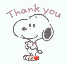 snoopy is holding a heart in his hand and saying `` thank you '' .