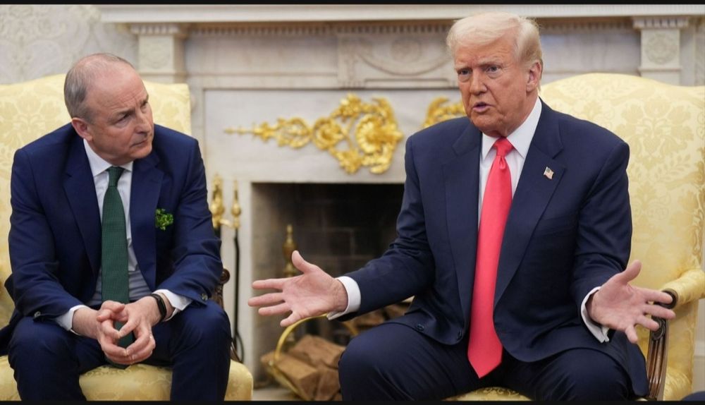 Irish Taoiseach (head of government) Michael Martin, sitting beside Donald Trump and hating every minute of it. 