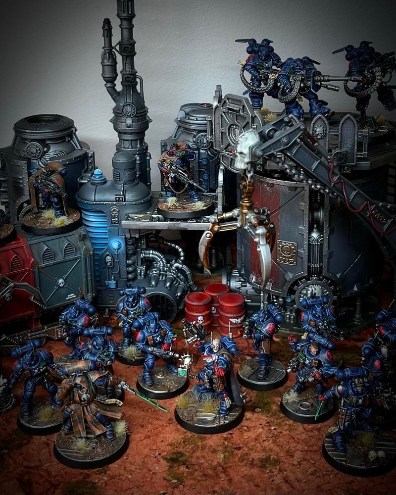 Crimson fists infiltrator army in dense industrial terrain