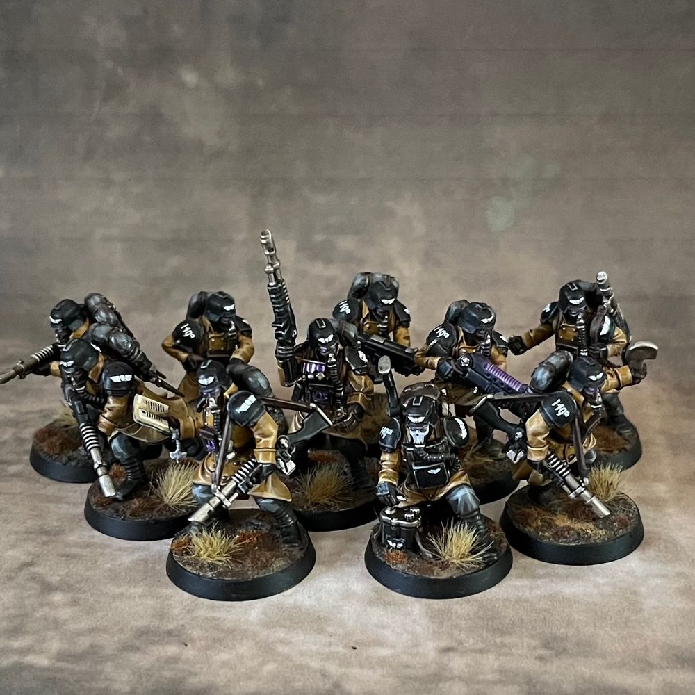 Ten death korps of Krieg infantry in yellow and black steel legion colours