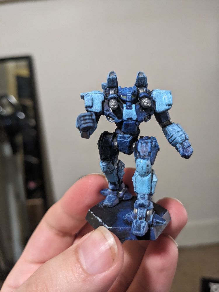 My original paint job from Adepticon. It was my first time drybrushing color over a black base coat. This was a good opportunity to learn how to strip a mini! 