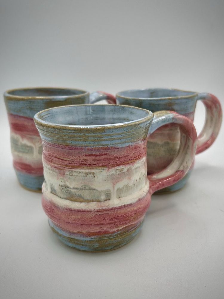 3 mugs in trans pride colours