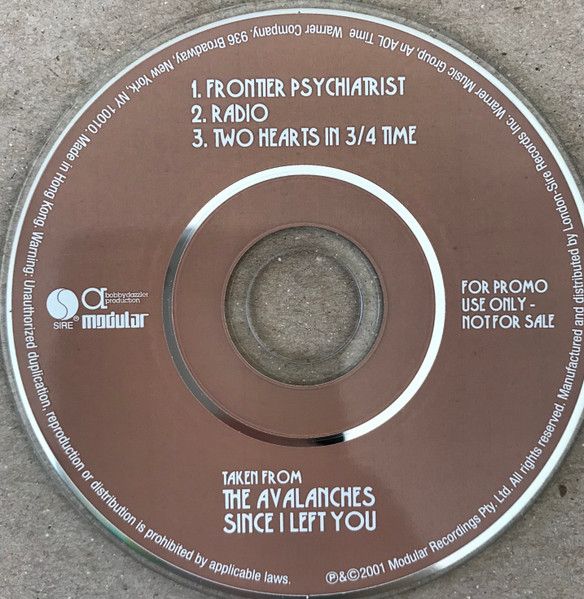The 3” mini-CD (the actual disc) that was a promo for the Avalanches’ 2001 album Since I Met You. It contains the three songs “Frontier Psychiatrist,” “Radio,” and “Two Hearts in 3/4 Time.” It’s labeled “FOR LROMO USE ONLY - NOT FOR SALE” is dated 2001 by Modular Recordings Pty, Ltd.