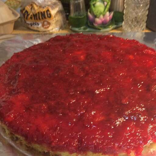 A photo of Fresh Strawberry Upside Down Cake, probably perfectly framed and looking great