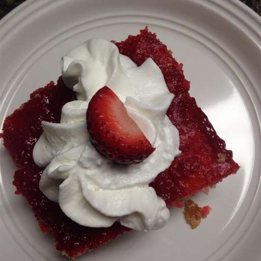 A well-lit photo of Fresh Strawberry Upside Down Cake