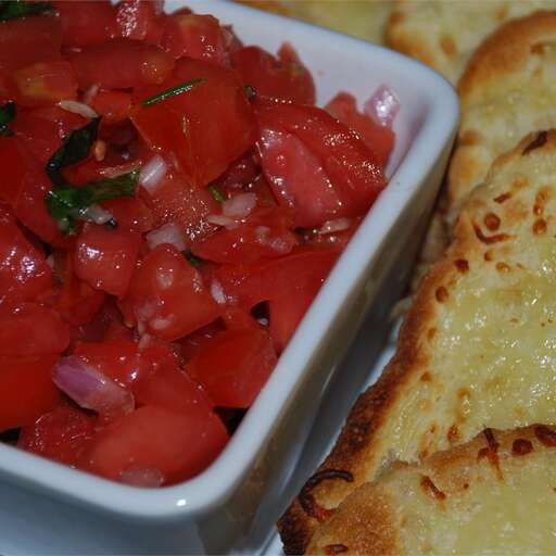 A well-lit photo of Ali's Amazing Bruschetta