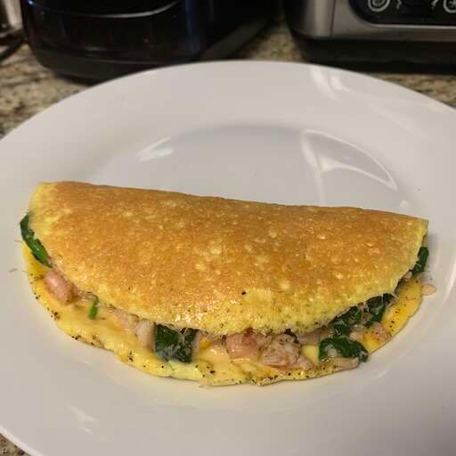 An enticing photograph of Parmalet (Crisp Parmesan Omelet)