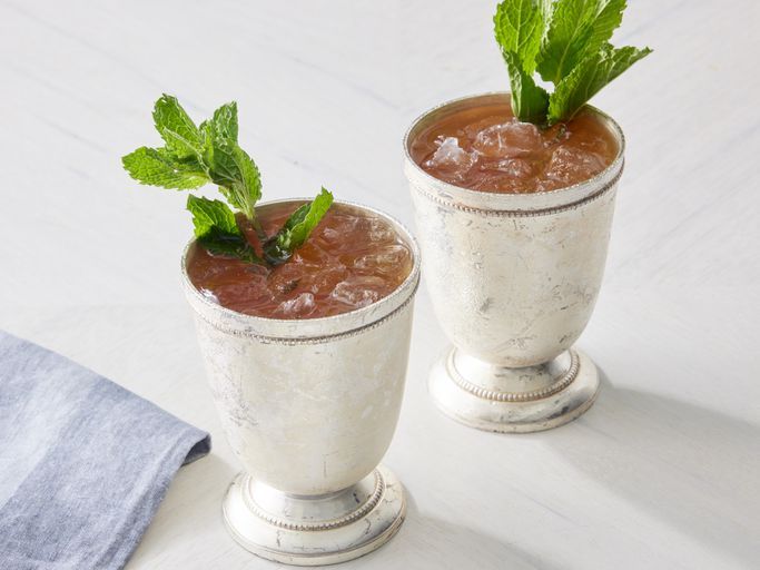 Mint Julep in metal glasses, garnished with mint leaves