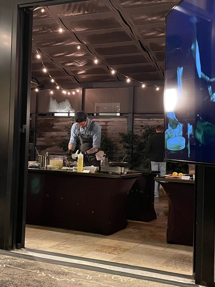 A professional chef making latkes for a latke competition