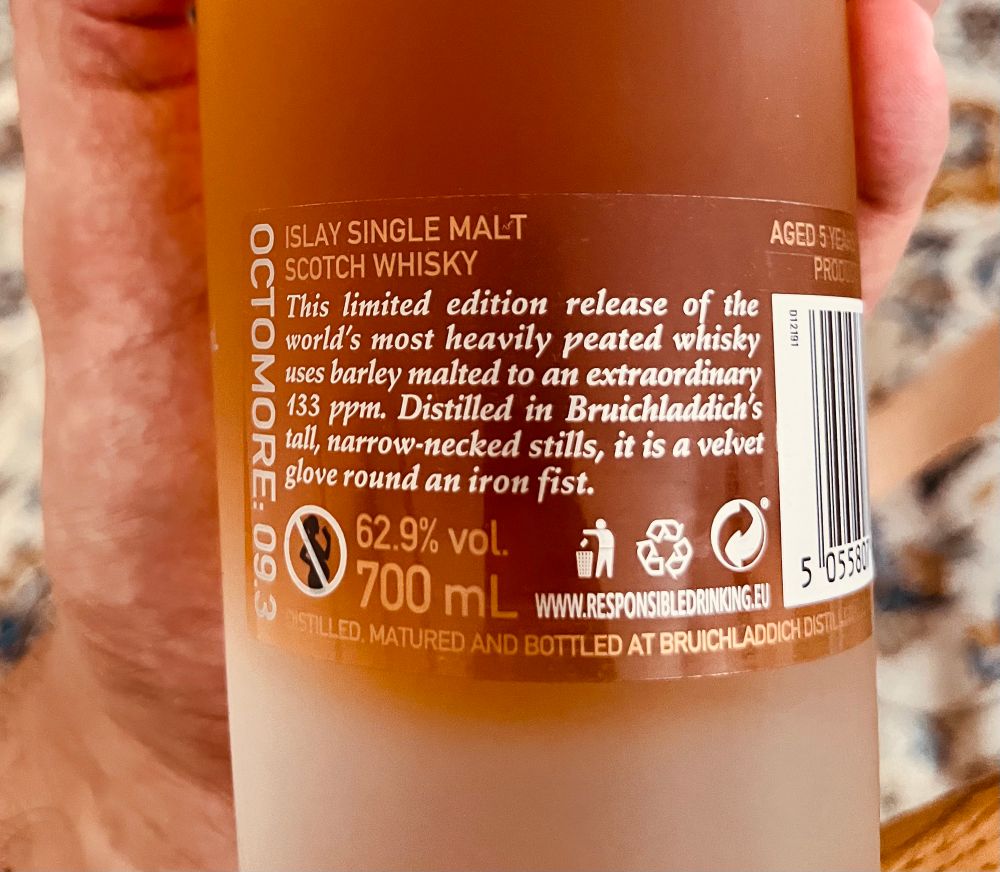 Photo of a whisky bottle label. ”… it is a velvet glove around an iron fist.”