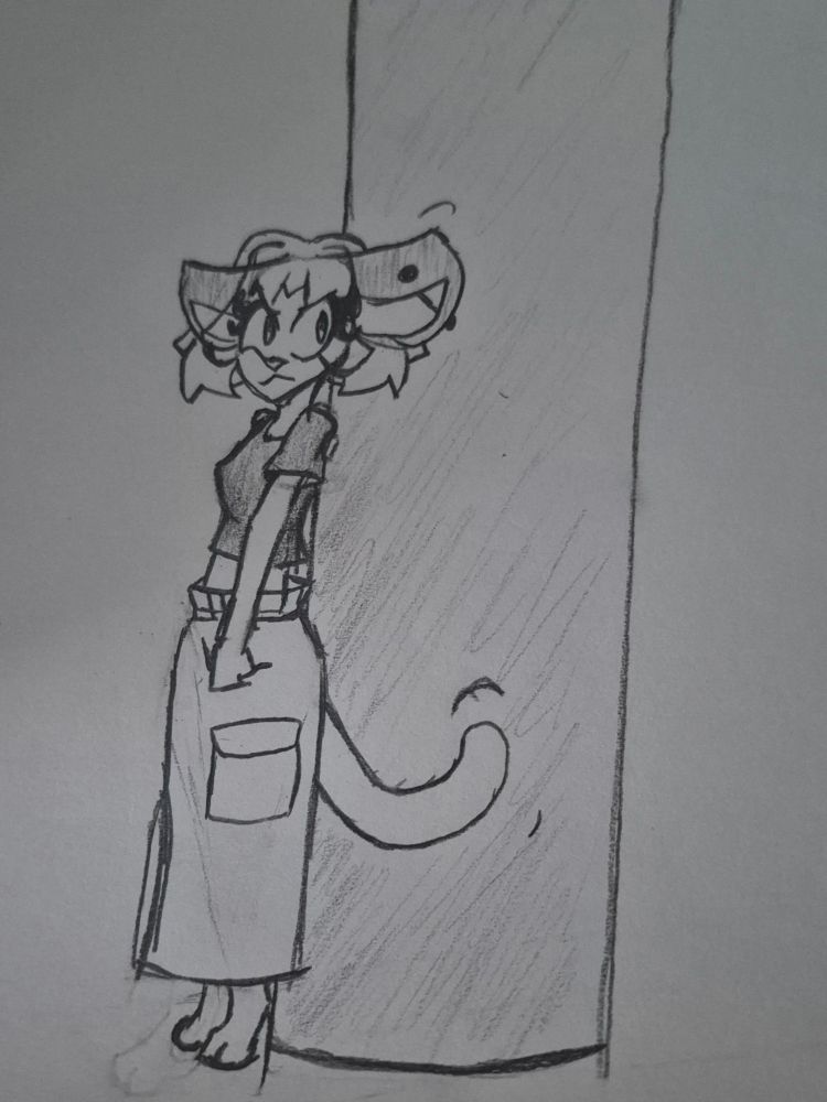 Persimmon the cat standing with her back pressed up against a stone pillar. Her left ear twitches as both ears are pinned backward in focus.
She's looking behind her in suspicion