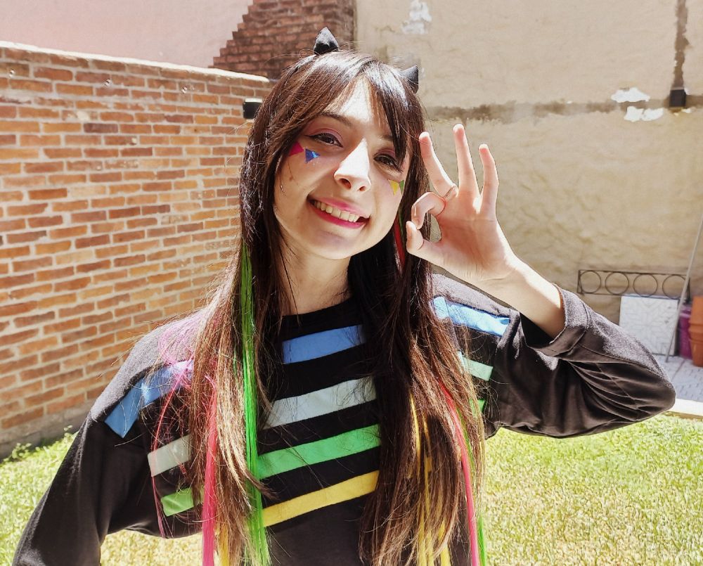 Picture of me doing Multi's influencer pose with my cosplay Of her