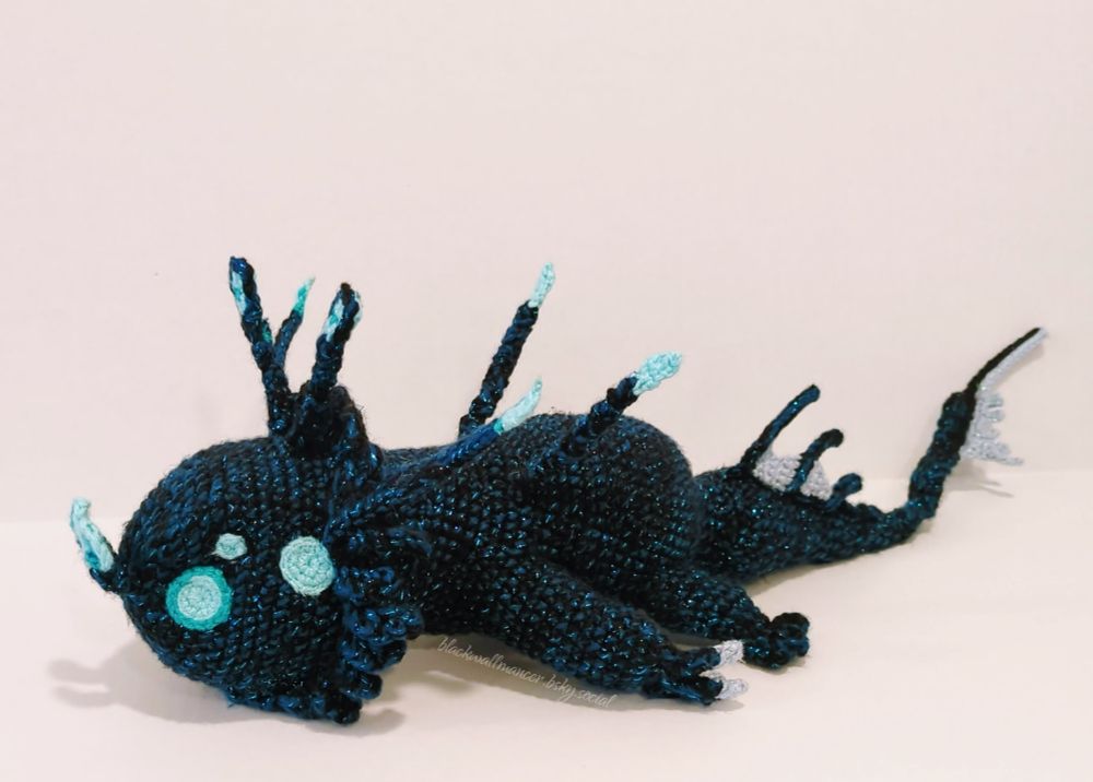 The same amigurumi from the previous image, seen from the side and facing to the left.
