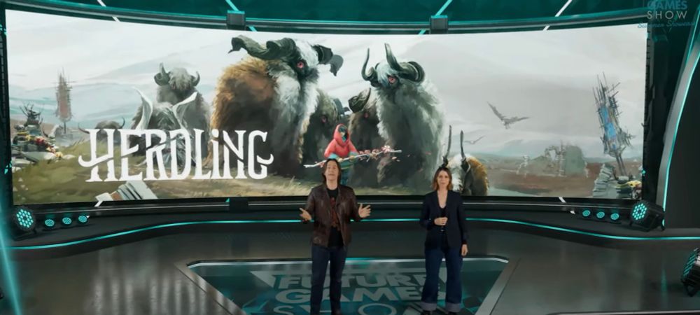 Herdling artwork on a very big widescreen during the future games show