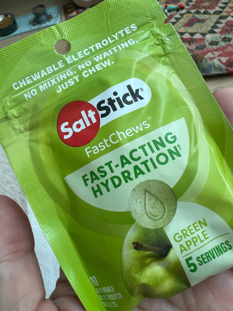 A packet of green apple flavored “salt stick” chews for electrolyte support in extreme heat. 